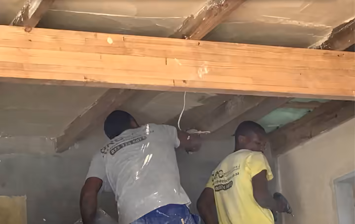 RC team working on roof structure and ceiling